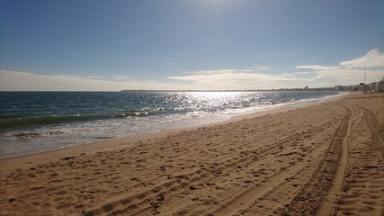 plage ciel soleil oc&eacute;an mer reflet vagues sable 