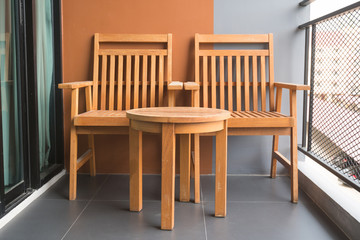 Wooden chair on the balcony
