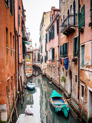 Fototapeta na wymiar Colourful photo of a canal in Venice