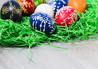 Hand made easter egg in green grass