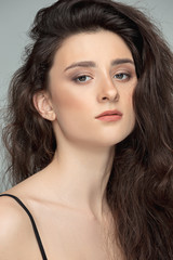 Fototapeta premium Beauty portrait of a charming woman looking at camera