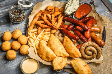 Plate with sausages and fries