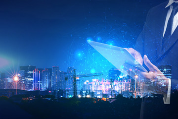 Business person working with modern virtual technology graphic design background.Mixed media