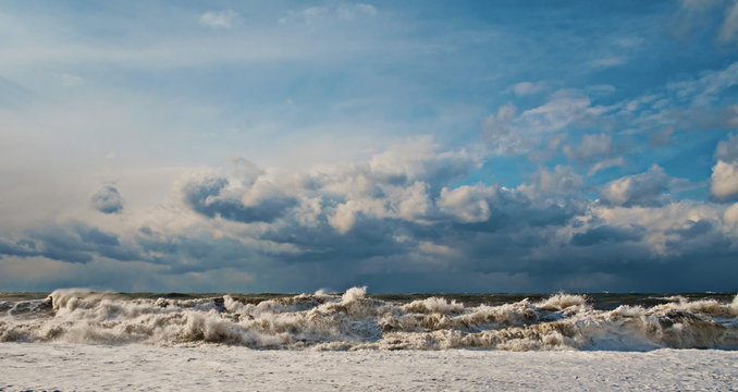 Sea waves breaking the shore,