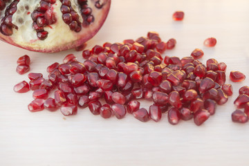 Ripe red rains of garnet close up.