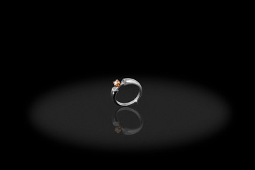 Platinum precious ring female with diamonds on black background.