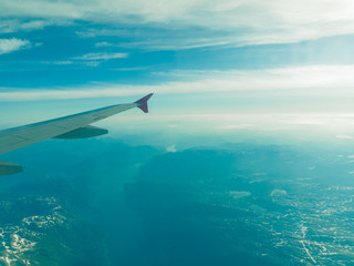 Fototapeta na wymiar Beautiful sky and land view from plane
