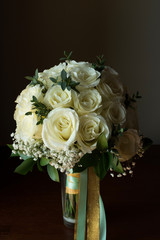 White rose flower bouquet in bundle shape for bridal in wedding ceremony