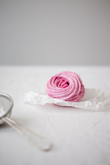 Homemade pink zephyr or marshmallow on white background
