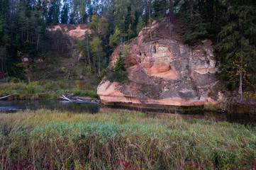 Sandstone outcrops. Zvartes Rock on the bank of Amata river. - 193005888