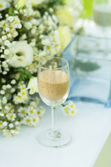 Clear glass with sand inside in sand wedding ceremony