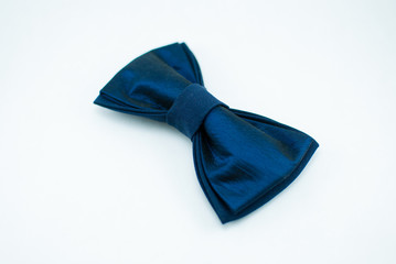 Well-designed stylish dark-blue bow tie made of soft cloth