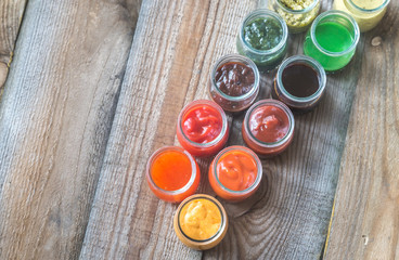 Assortment of sauces in the glass jars