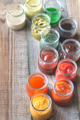 Assortment of sauces in the glass jars