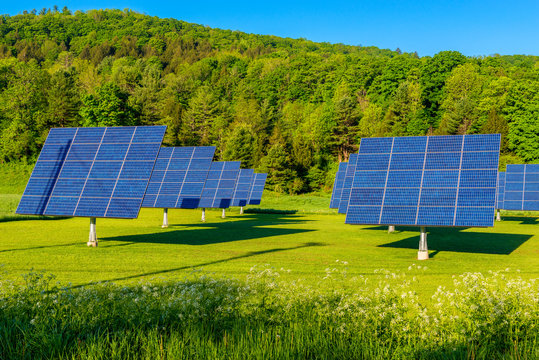 Solar Panels in a Field in Woodstock, Vermont, USA on early spring day
