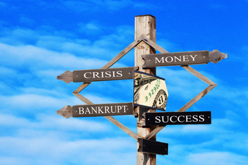 Wooden sign pattern arrows on sky background, business concept