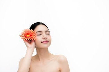 Fototapeta na wymiar Young beauty Asian face with flower, beautiful woman isolated over white background. Healthcare and Skincare concept