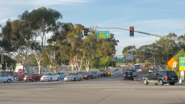 CARS TRAVELING TO THE MEXICO BORDER CROSSING HIGHWAY EXIT.