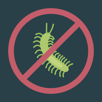 Green centipede on dark background red circle warning sign
