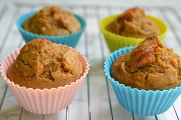 Fresh baked muffins on a rack