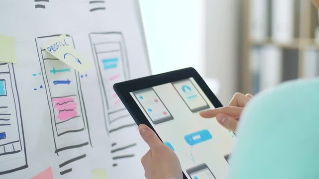 woman working on tablet pc interface design