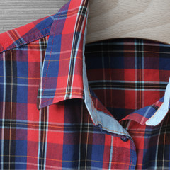 Men's shirt. Clothes close-up. Background of fabric. Fashion