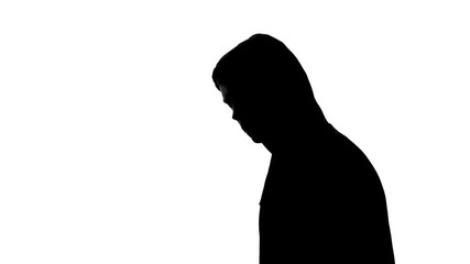 Aggressive bully in hood looking to camera and threatening to people, criminal