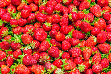Fresh ripe strawberry red fruits, seasonal healthy and vitamin food, natural background