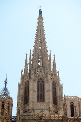 Fototapeta na wymiar The Cathedral is dedicated to the Holy Cross and Saint Eulalia, the patron Saint of Barcelona