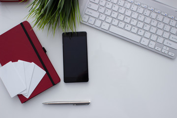 business concept top view smartphone notepad record contract work cutaway