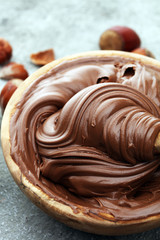 Homemade hazelnut spread in wooden bowl. Hazelnut Nougat cream