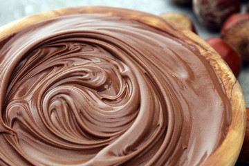 Homemade hazelnut spread in wooden bowl. Hazelnut Nougat cream