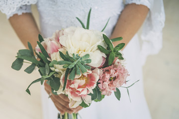 wedding bouquet in bride hands