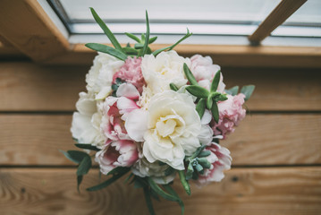 wedding bouquet standing on the wooden window 2