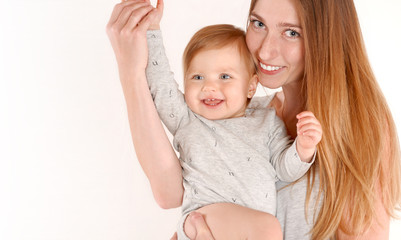 Little cute baby on mother's hand