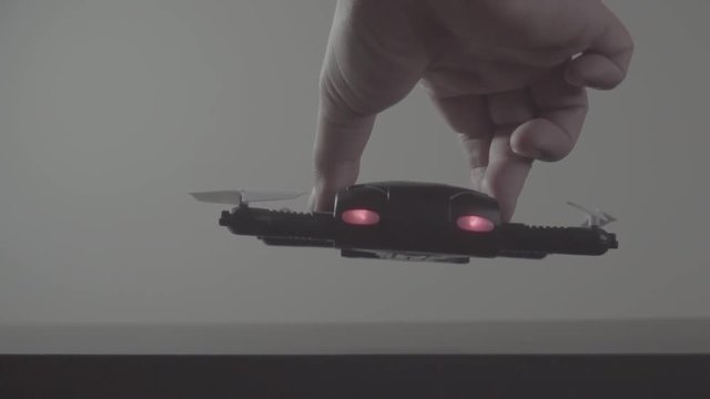 Futuristic transportation concept.Micro drone take off from laptop computer