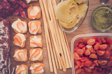 some food in vintage filter on the wood table