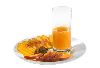 Fresh peaches in a white plate on a white background.
