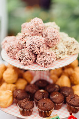 Assortment of sweet baked goods on beautiful trays