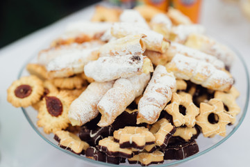 Assortment of sweet baked goods on beautiful trays