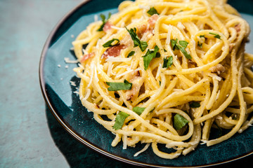 Spaghetti carbonara with egg and pancetta