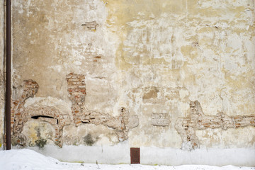 abandoned grunge house, white cracked brick stucco wall