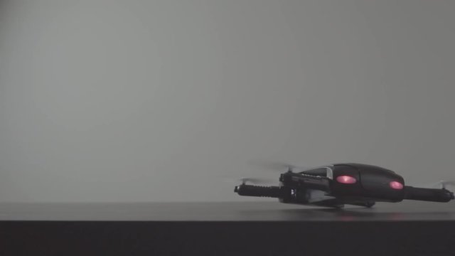 Futuristic transportation concept.Micro drone take off from laptop computer
