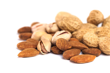 Mix of nuts close up on white background