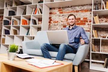 Young man with a laptop