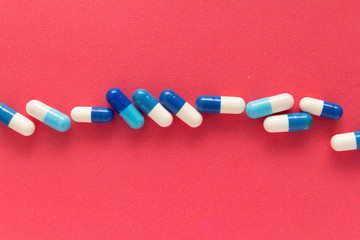 Group of assorted white and blue tablets.