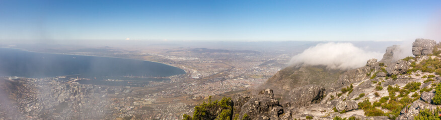 Panoramic view of Cape Town and its harbour in summer from the top of Table Mountain