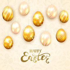Happy Easter and golden eggs on beige background
