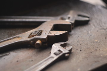 a set of old rusty adjustable wrench close up
