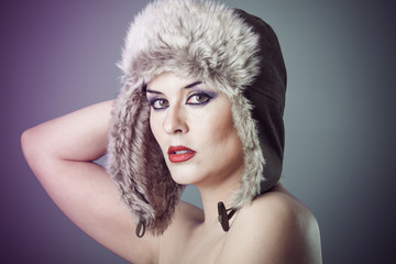 beautiful nude woman with furry winter hat girl cold